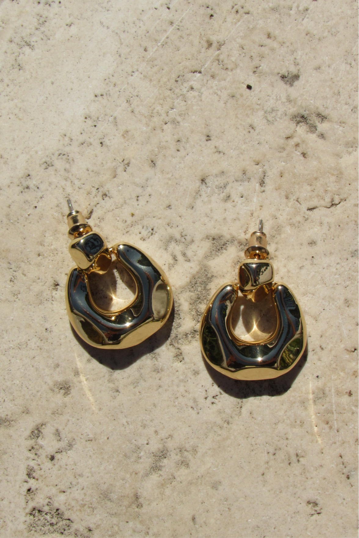 Dented hoop earring