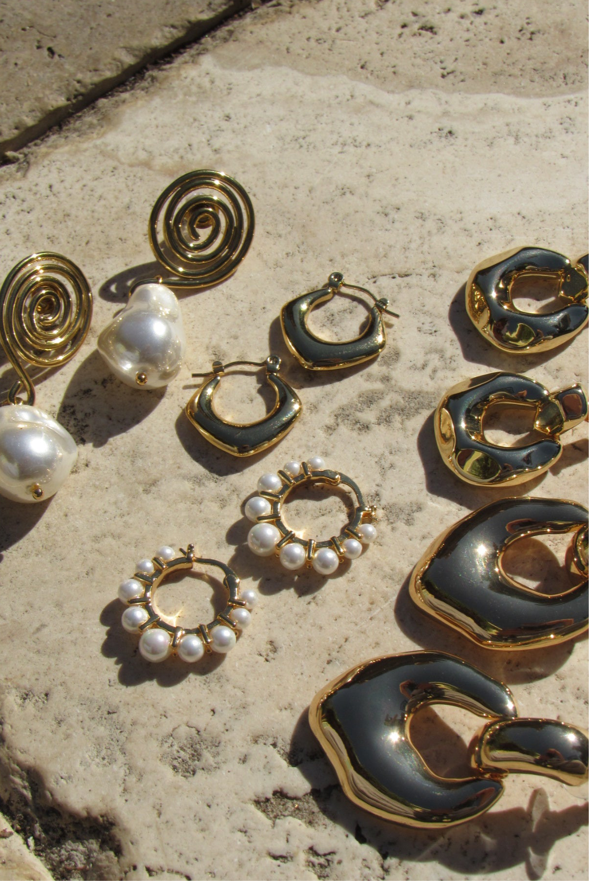 Large warped earring 18k
