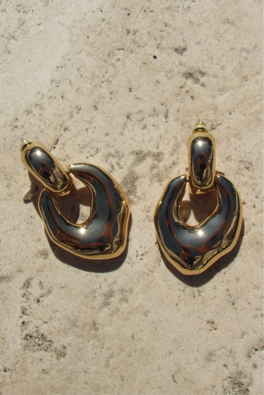 Large warped earring 18k